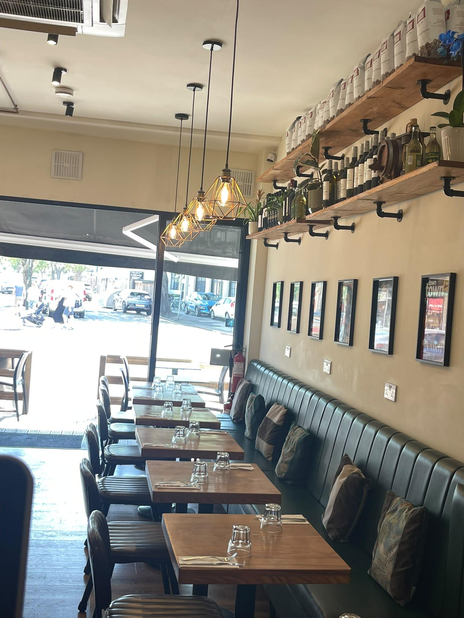 Inside Greek Unique, looking out to Heath Road